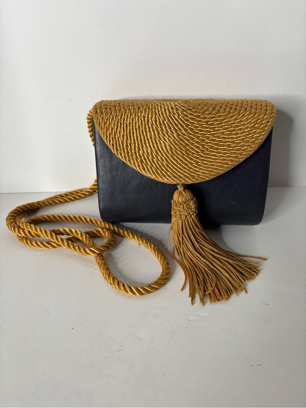 Black and Mustard Rope-Trim Tassel Crossbody Clutch